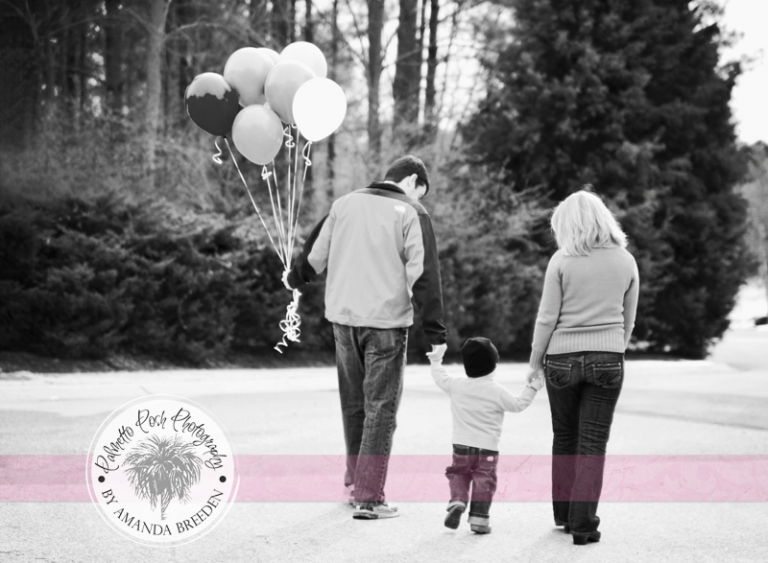 family picture, family walking with ballons