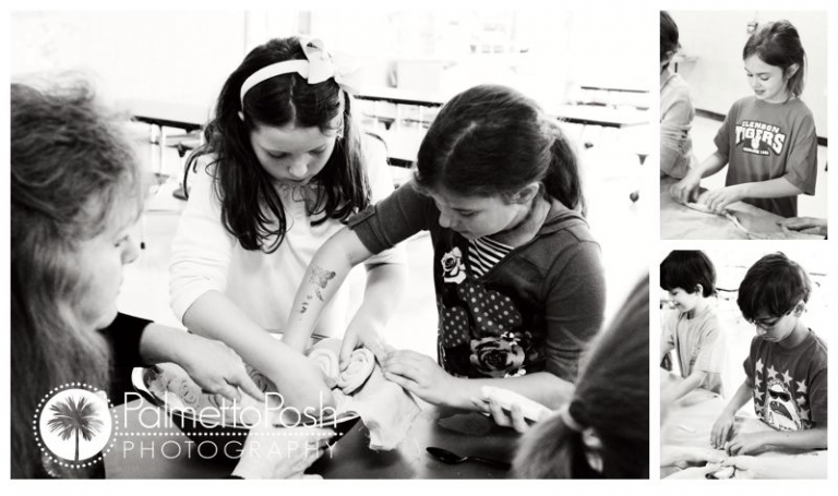 girls working with clay in bowl